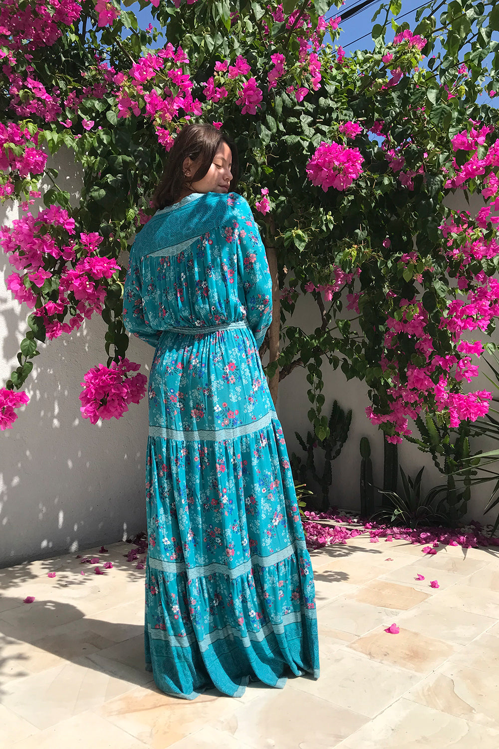 The Alannah Maxi Dress in Capri Blue from Tulle and Batiste, showcasing ethically manufactured modern bohemian clothing, designed for style and sustainability.