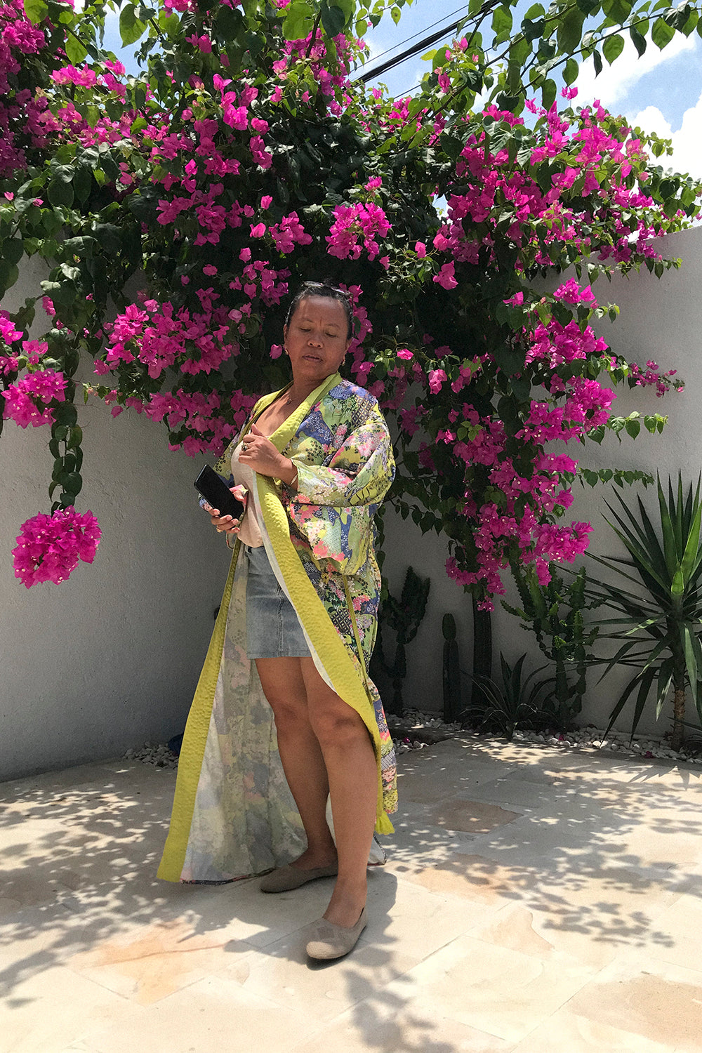 Experience the epitome of artisanal luxury with the Floral Mirage Kimono, crafted with care and precision by our talented artisans in Bali, ensuring both quality and ethical production.