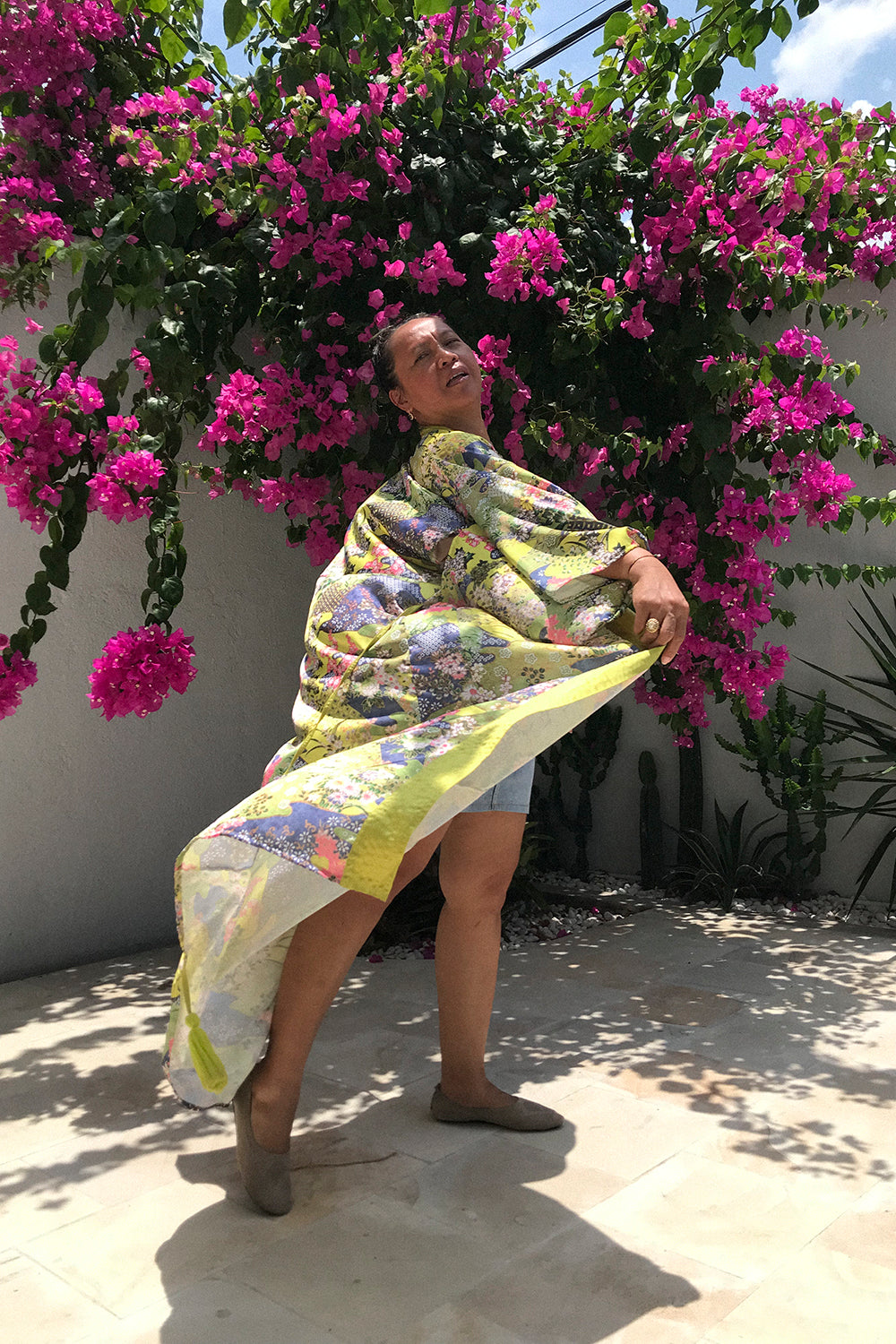 Indulge in the exquisite craftsmanship of the Floral Mirage Kimono, a wearable masterpiece that celebrates the beauty of handcrafted design and sustainable fashion.