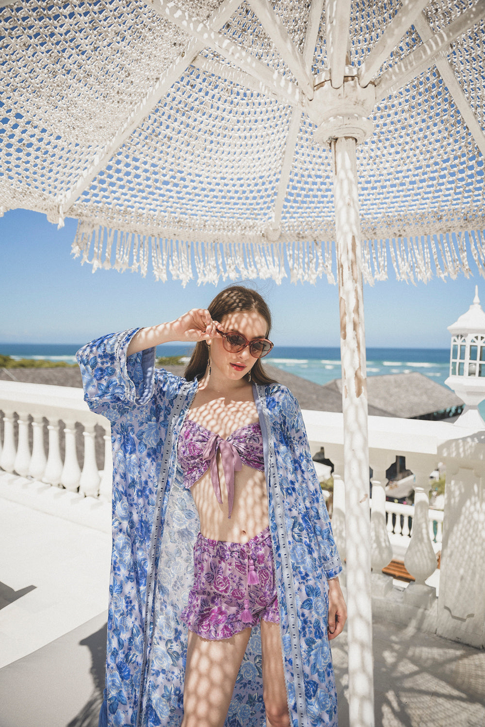 Wrap yourself in luxury with the Peony Long Robe, a kimono-style masterpiece from Tulle and Batiste's Peony collection, crafted ethically by Balinese artisans