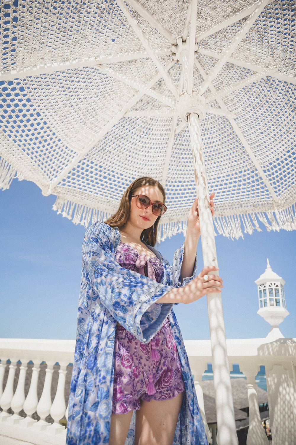 Experience the luxury of lounging in style with the Peony Long Robe, a kimono masterpiece from Tulle and Batiste's Peony collection, ethically handmade by Balinese artisans