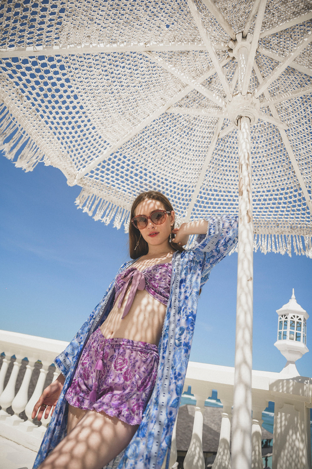 Channel effortless chic with the Peony Long Robe, a modern boho kimono meticulously crafted by Balinese artisans at Tulle and Batiste, ensuring ethical production