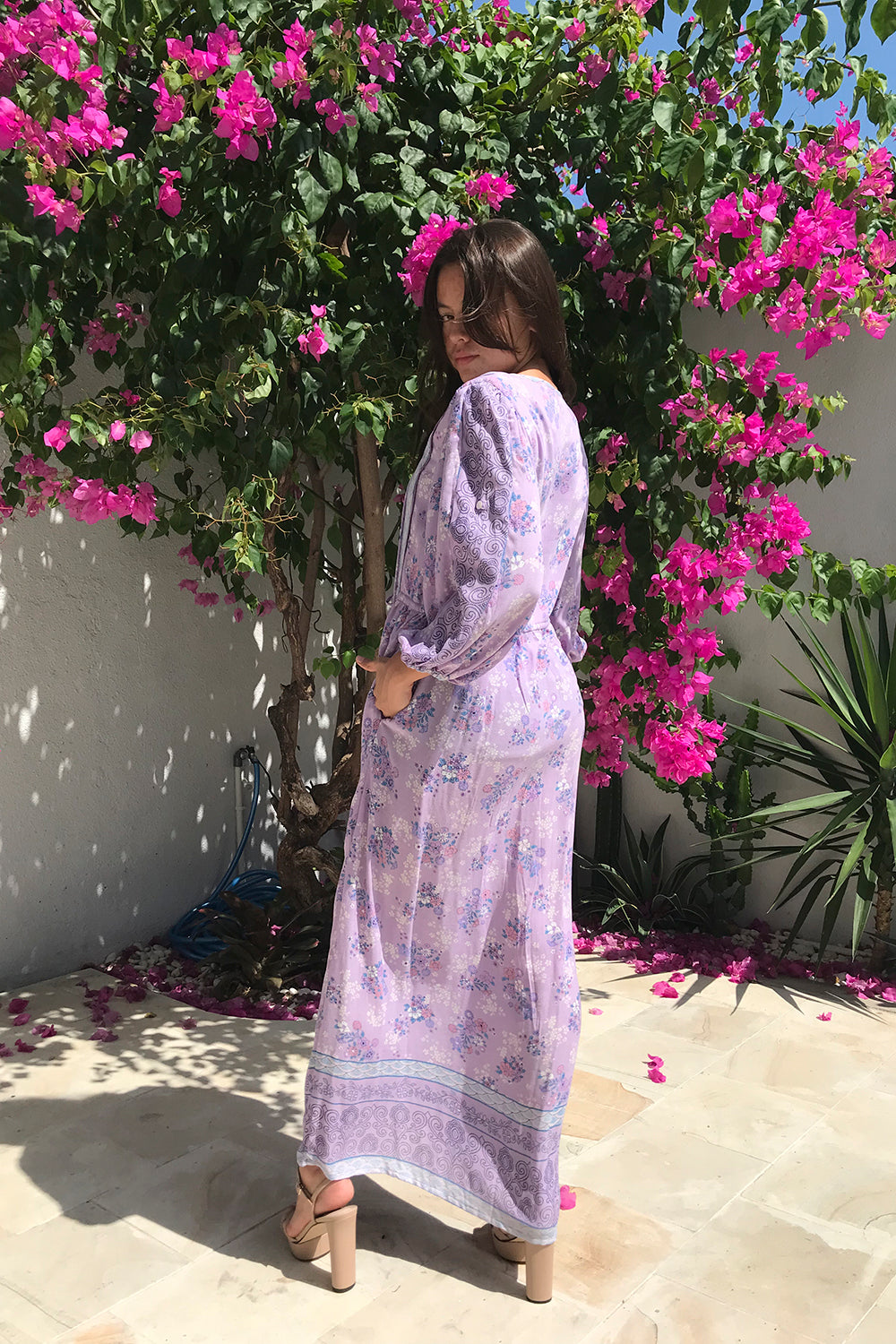 A modern bohemian-inspired, handmade design, the size-inclusive Roseanne Boho Dress in Lilac by Tulle and Batiste.