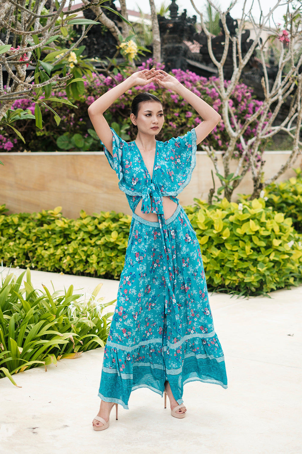 Modern bohemian aesthetics shine in the timeless Tumi Cape Dress by Tulle and Batiste.