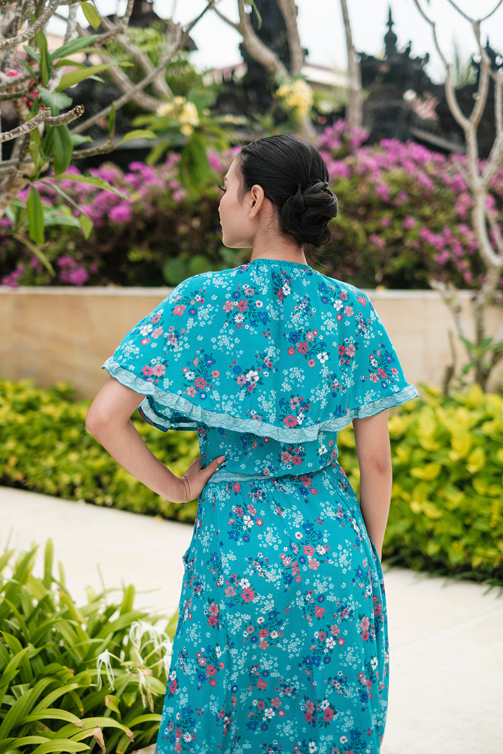 Balinese artisans bring the Tumi Cape Dress by Tulle and Batiste to life with exceptional attention to detail.