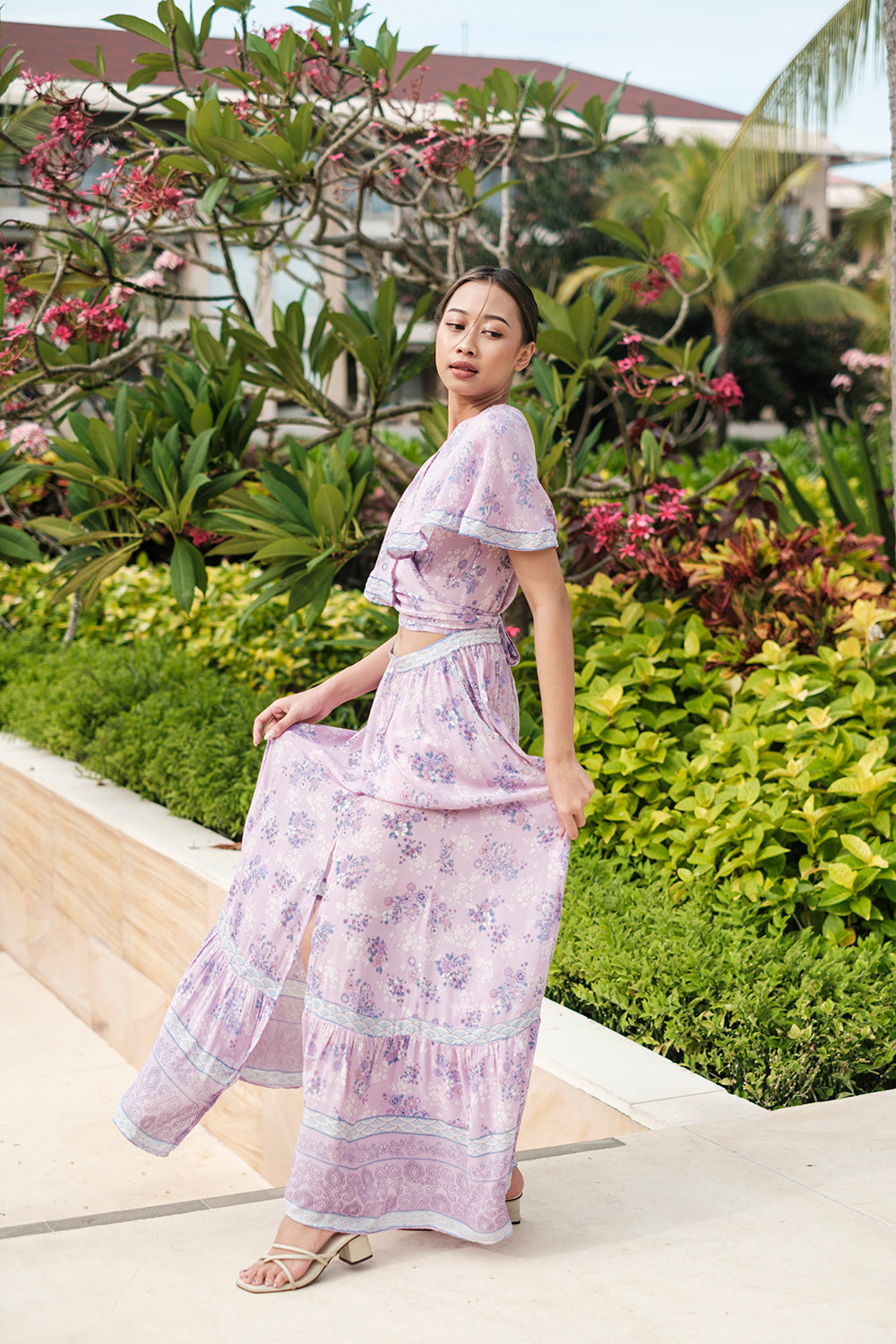 The Tumi Cape Dress by Tulle and Batiste, available in all sizes, with complimentary custom tailoring for the perfect fit.