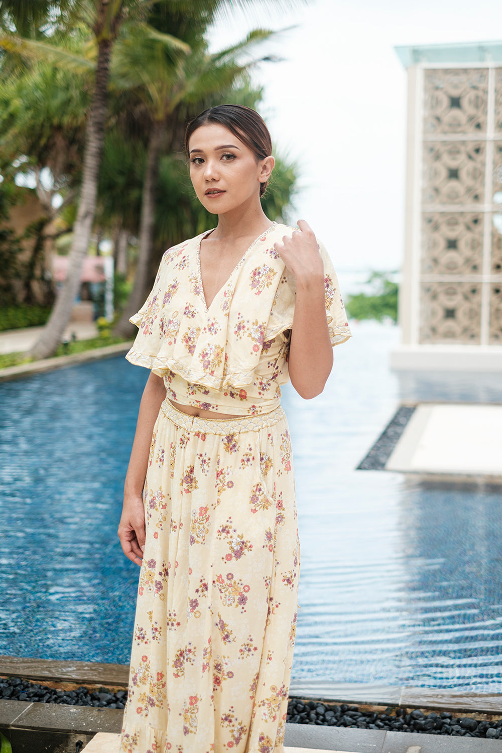 Modern bohemian aesthetics shine in the timeless Tumi Cape Dress by Tulle and Batiste.