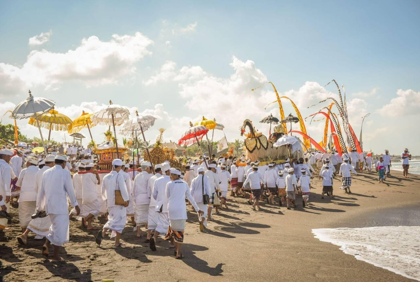 In the heart of Bali, where emerald rice paddies meet the azure sea, there exists a tradition as old as time itself, Melasti, a sacred ceremony that heralds the arrival of the Balinese New Year.