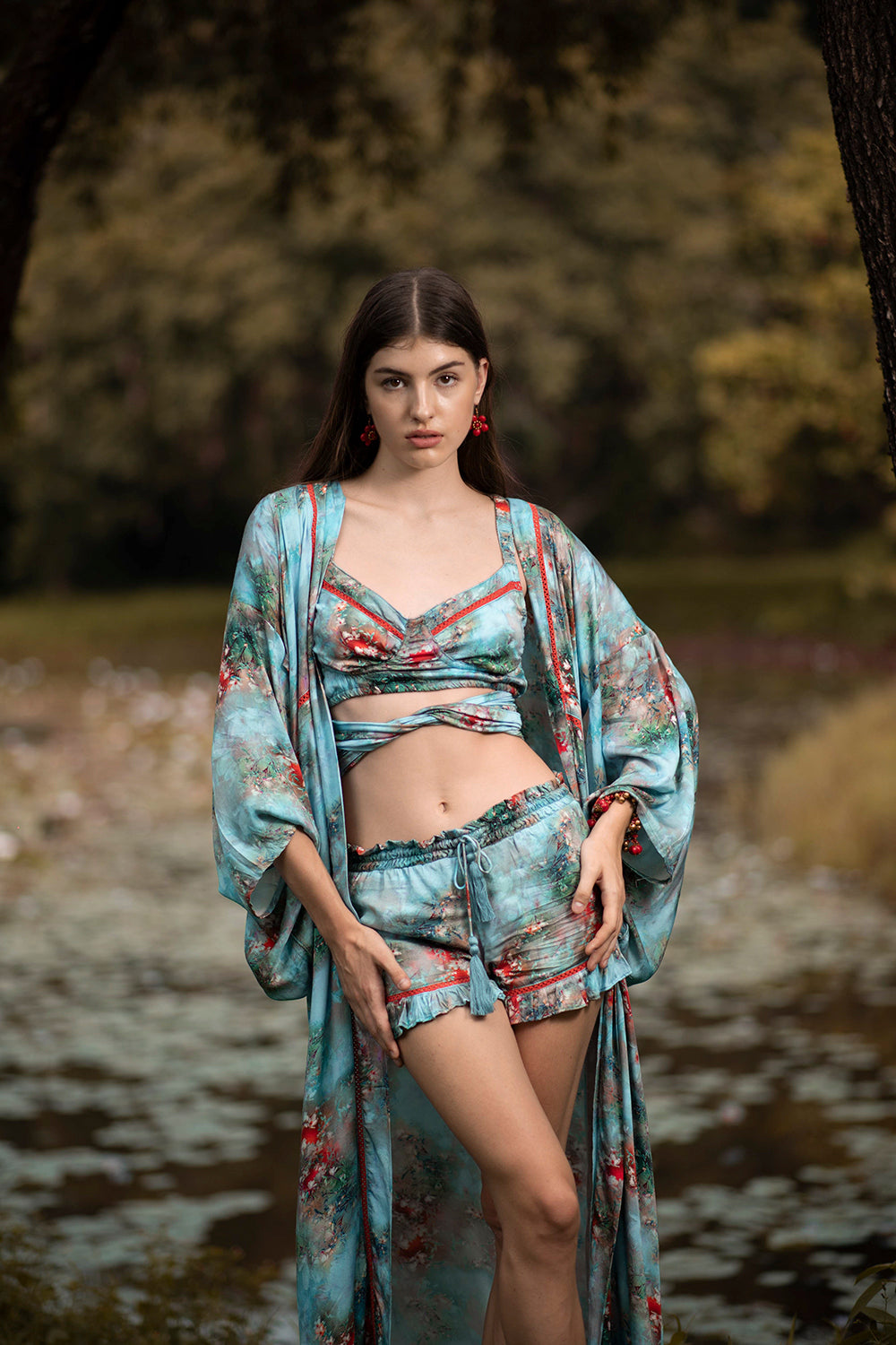 Channel your inner free spirit with the Moriko Kimono's flowing silhouette and whimsical details, perfect for adding a touch of romance to any ensemble.