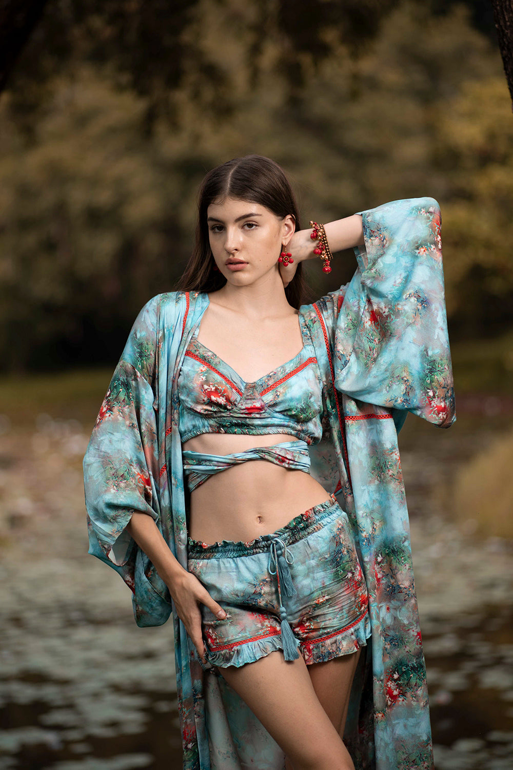 Drift away on a sea of tranquility with the Moriko Kimono's serene forest blue hues, reminiscent of Bali's breathtaking landscapes and ethically produced for guilt-free indulgence.